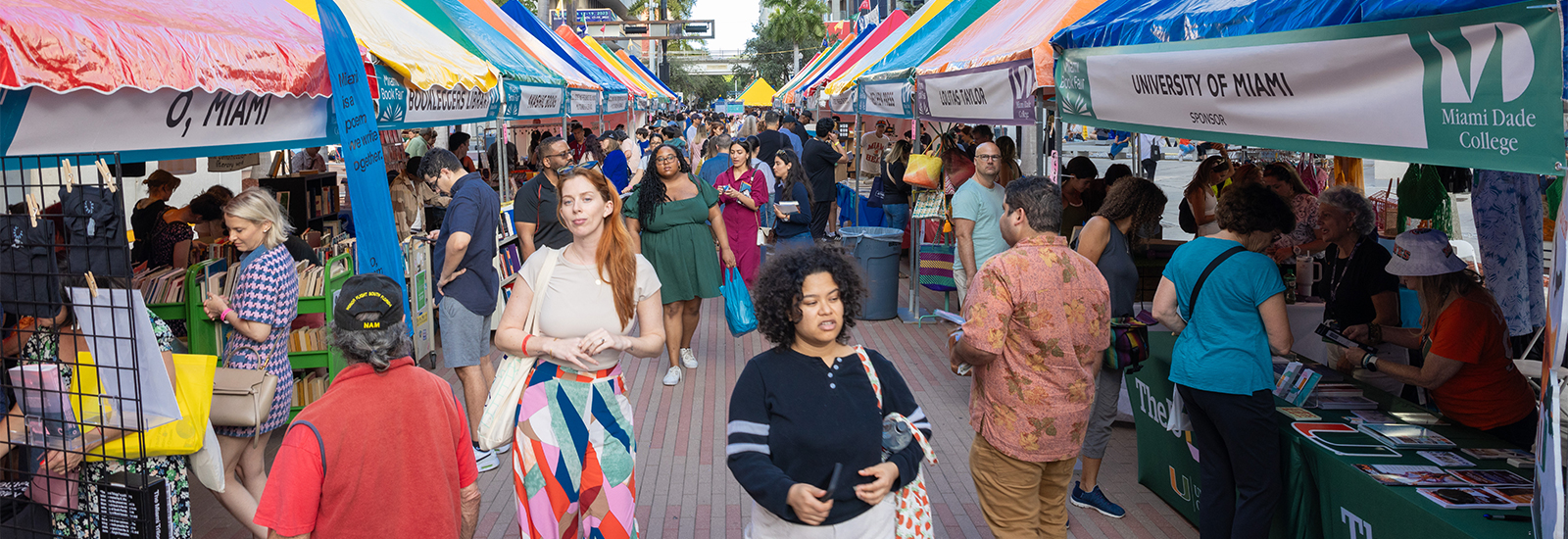 Patrons browse the booths in downtown Miami during the 2023 Miami Book Fair.